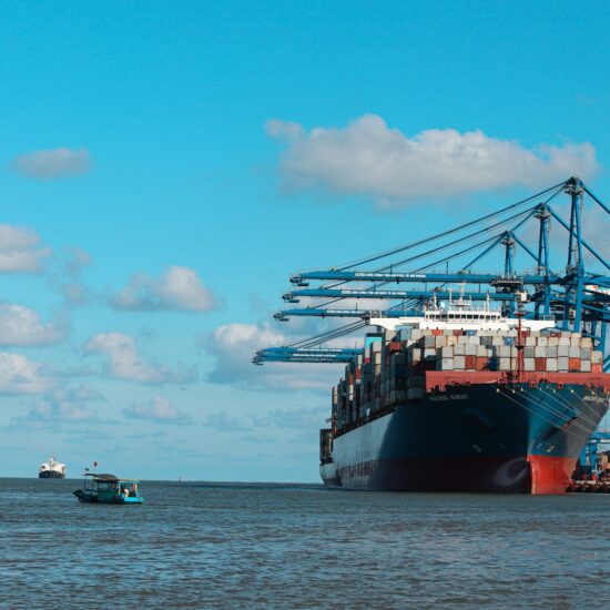 Container carrier waiting to take off. Hai Phong International Container Terminal (HICT), Vietnam (Jully 2022)