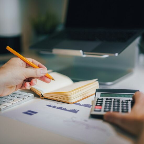 Currencies and finance. Stock exchange. Calculator on the table